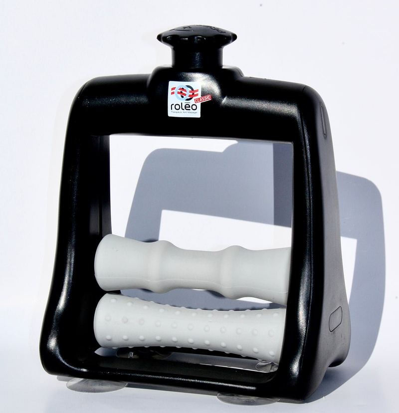 Roleo Arm & Hand Massager, front view: a black arch-shaped frame with a pressure-adjustment knob on top and two light grey textured rollers inside, standing on suction cups.
